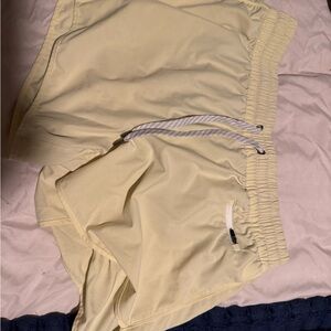 Vuori Women's Cream Athletic Shorts